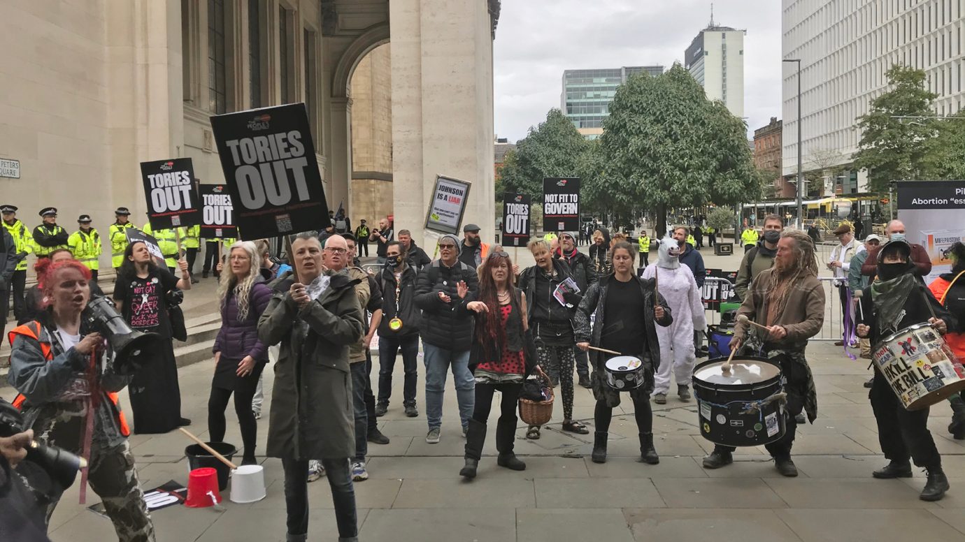 Protestors gather in Manchester to voice opposition of Tory Party ...