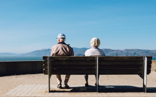 two people sat on a bench