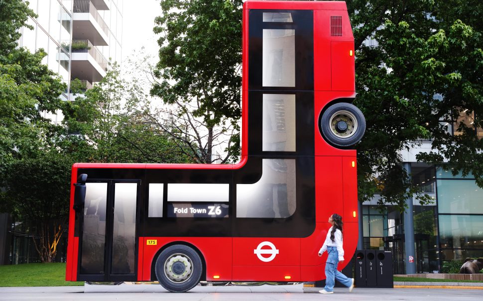 A folded London bus is unveiled at Bishops Square to celebrate the launch of Samsung’s Galaxy Z series. Picture issue date: Wednesday 24th July 2024. London. Created by Caspar Philips, the bus is folded at 90-degrees and forms a part of the wider Fold Town art project commissioned by Samsung to mark the release of the Samsung Galaxy Z Flip6 and Z Fold6 – now with Galaxy AI technology.