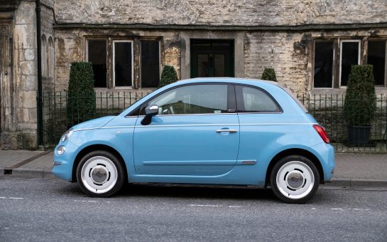 A sky blue Fiat 500