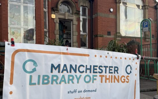 A banner hung outside of the Old Library in Levenshulme with Manchester Library of Things written on it.